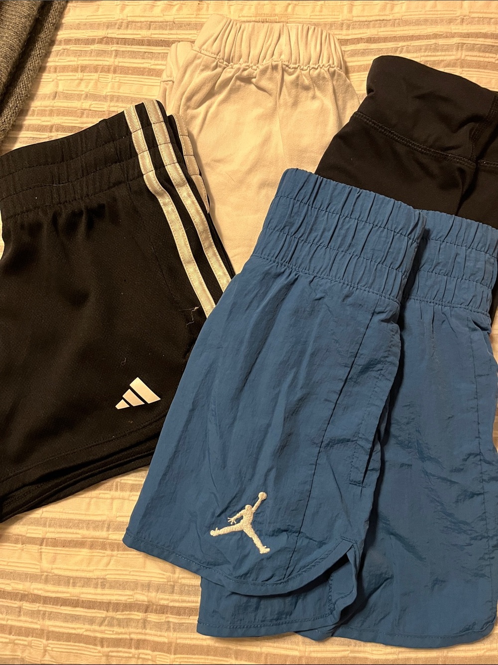 Size 7-8 lot of 4 pairs athletic shorts addidas Jordan and crew cuts